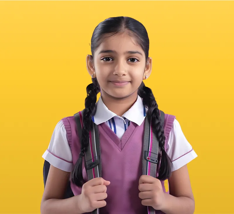 Portrait of Primary Schoolgirl Wearing Uniform and Backpack