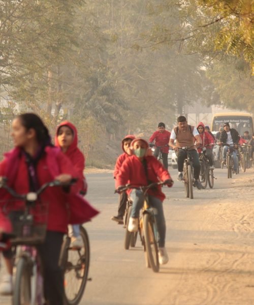 Students Riding Bicycles Outdoors During Morning School Rally