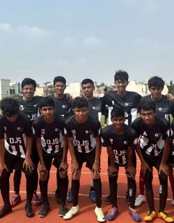 DJS School Football Team Posing on Running Tra